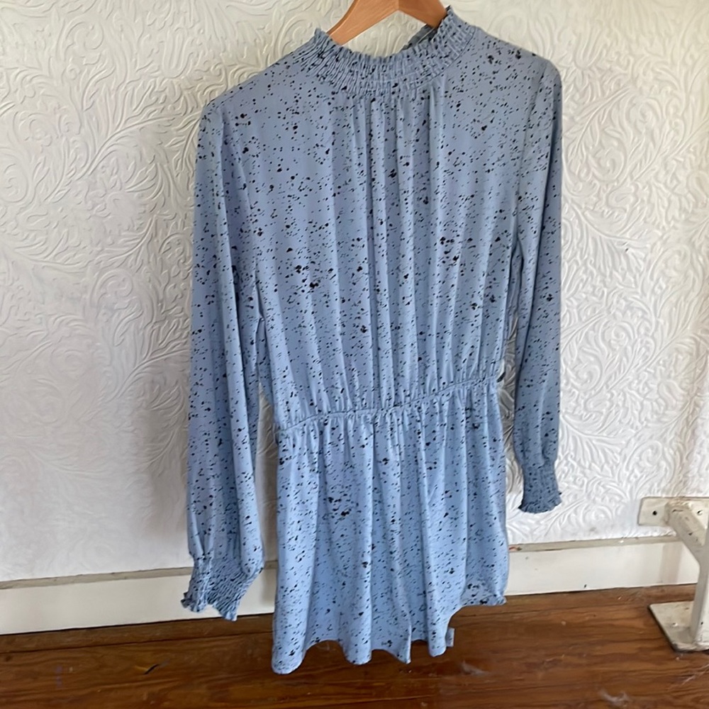 Romper. Long sleeve. Print. Perfect for an evening out or a fall day